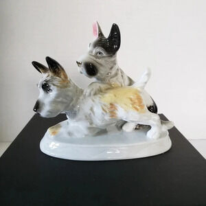 Vintage German  Glazed Ceramic Pair of Scottie Dogs.